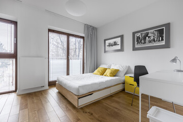Fototapeta na wymiar White bedroom with bed and desk