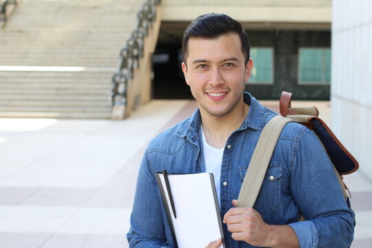 Mixed Ethnicity Student Smiling On Campus 