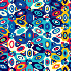 Abstract seamless pattern of bright chaotically arranged geometrical elements.