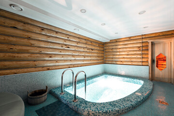 pool and sauna in a rustic log cabin, in the mountains. with a beautiful interior. house of pine...