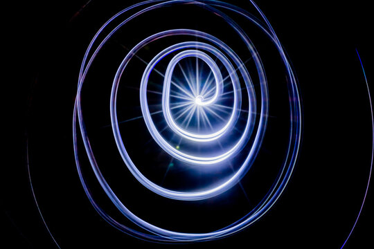 abstract picture light trail, the spiral on black background