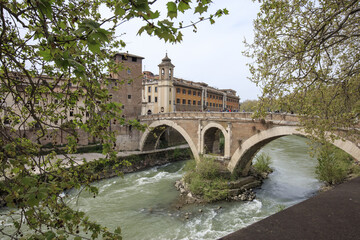 Obraz premium View of Lungotevere boulevard running along the river Tiber with typical bridges and buildings Rome Lazio Italy Europe