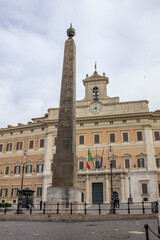 Fototapeta na wymiar View of the square with the obelisk of Palazzo Montecitorio the seat of the Italian Chamber of Deputies Rome Lazio Italy Europe
