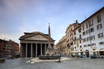 Fototapeta na wymiar View of old Pantheon a circular building with a portico of granite Corinthian columns and its fountains Rome Lazio Italy Europe