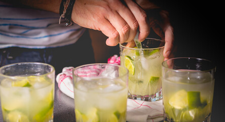mix of Brezilian caipirinha with a teaspoon on a cloth