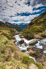 Fototapeta na wymiar Cristal clear water in Pyrenees stream