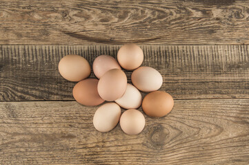 Eggs in a tray on a wooden background