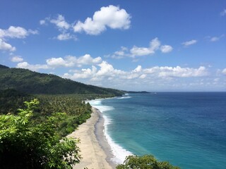 Beautiful blue beach on the coast of Senggigi, Lombok, Indonesia