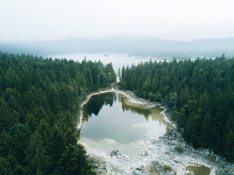 Aerial view of lake Eibsee with forest 