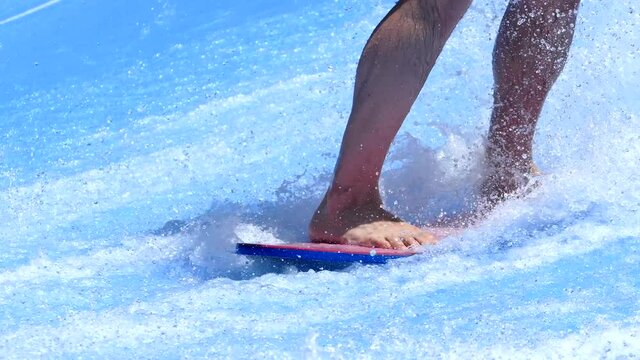 Flowboarding action on the surf machine extreme sports
