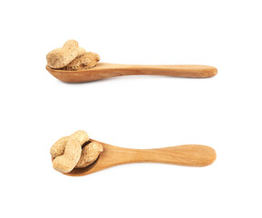 Spoon full of peanuts isolated