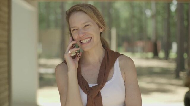 Mature woman talking on cell phone