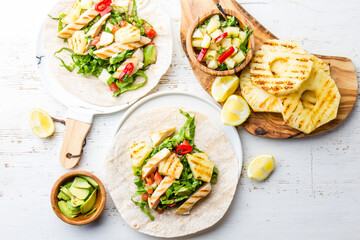 Mexican food. Chicken tacos street tacos with grilled pineapple and vegetables on white background 
