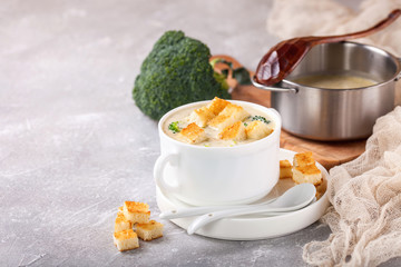 Broccoli cheese cream soup. Selective focus. Copy space