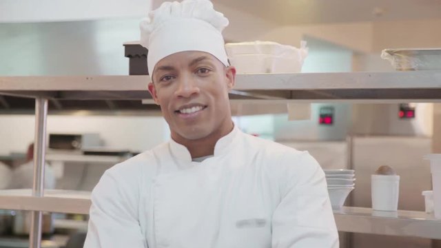 Chef standing in commercial kitchen