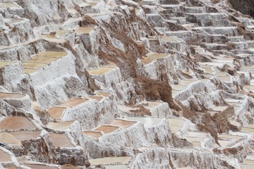 The densely grouped mountains side salt pans at Salineras de Maras in Peru