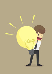 Businessman with a creative big bulb idea