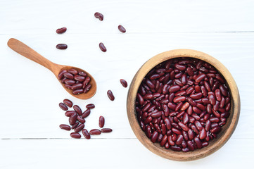 red beans in wooden bowl isolated on white background