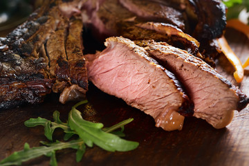 juicy grilled steaks on a cutting board