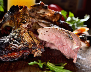 juicy grilled steaks on a cutting board