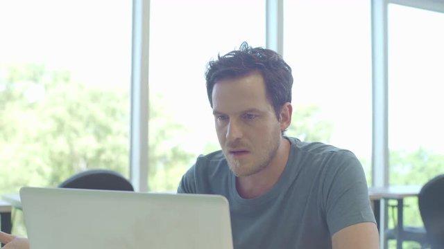 Man using laptop computer