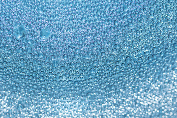 water drops on blue glass