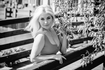 Obraz premium Beautiful woman travels on a Europe and have good mood and stylish clothes