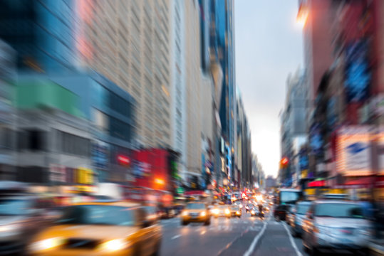 Blurred, defocused avenue parallel to Times Square in New York City