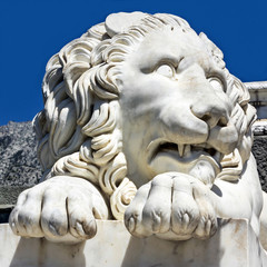 Fototapeta premium Marble sculpture of waking up lion in Vorontsov Palace in Alupka, Crimea, Russia.