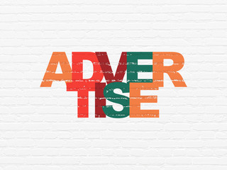 Marketing concept: Advertise on wall background