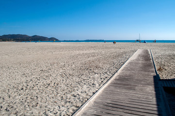 Porto Giunco, Sardinia - wooden power on a huge endless sandy beach