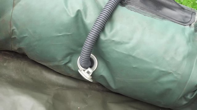 the boat PVC is pumped up by air by means of the electric pump.