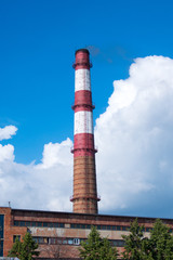 old power station chimney with deep blue sky background