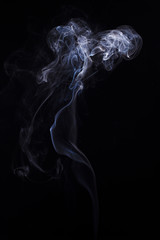 Swirl of smoke on black background