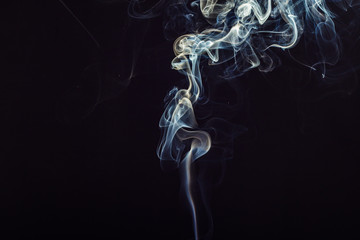 Swirl of smoke on black background