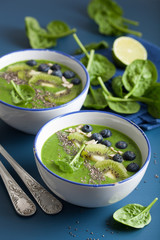green smoothie bowl spinach kiwi blueberry banana with chia seed