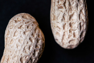 Peanuts on black background