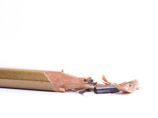 Closeup pencil with a broken tip on white  background