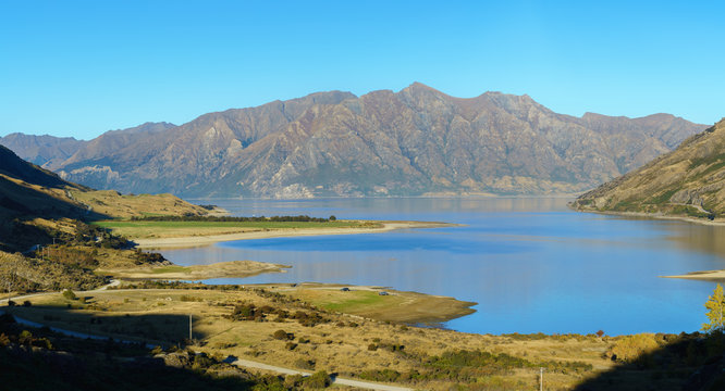 Panoramic image of Lake Hawea in clear blue sky , Queenstown-Lakes District , South Island of New Zealand