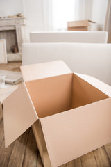 Close-up view of empty open cardboard box ready for packing, relocation concept