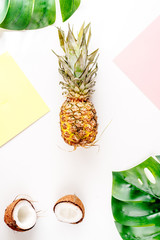 sliced exotic fruits on white background top view space for text