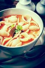 Fresh tomato soup with conchigliette. Instagram style filtred image.