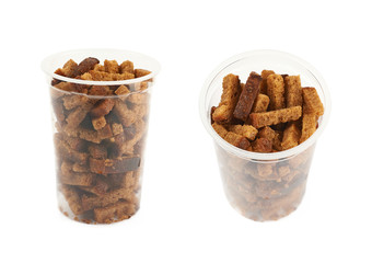 Plastic box filled with bread croutons