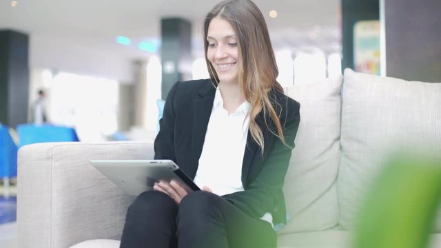 Woman using digital tablet