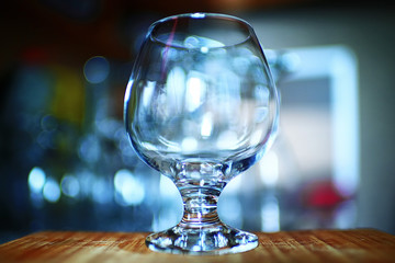 Glasses standing on a shelf