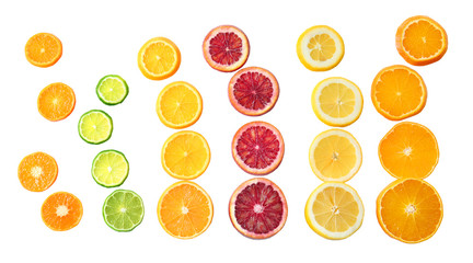 Slices of citrus fruits on white background