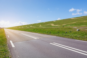 The road along The Hondsbossche Zeewering which is a 5.5 km long dike near Petten in The Netherlands