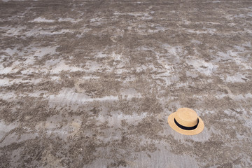 A summer hat on beach brown sand.