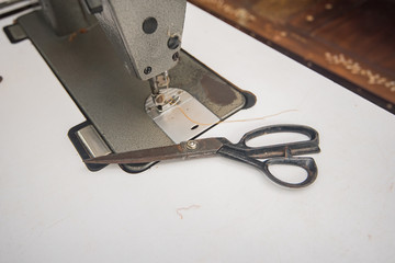scissors cloth and sewing machine