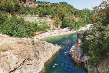 swimmers in the river Ardeche near the devil s bridge